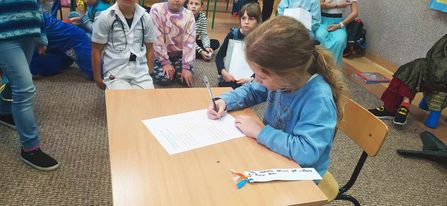 pasowanie uczniów klasy pierwszej na czytelników
